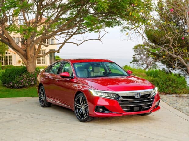 A red Honda Accord is parked on a driveway surrounded by trees and a scenic ocean view, HD Desktop Wallpaper