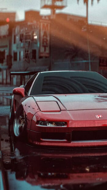 A red Honda NSX is parked on a wet street under soft lighting, 4K Mobile Wallpaper