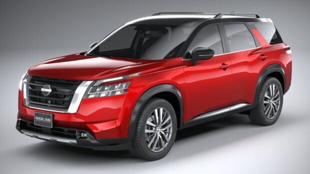A red Nissan Pathfinder stands against a gray background showcasing its front and side view, HD Desktop Wallpaper