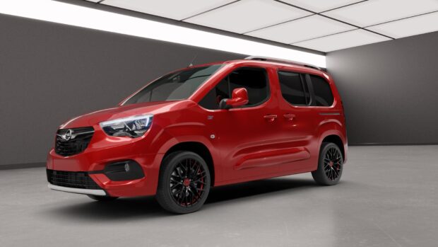 A red Opel Combo is displayed in a sleek indoor showroom with modern lighting, HD Desktop Wallpaper