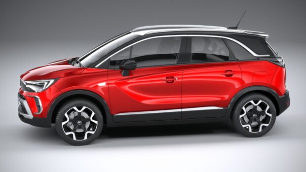 The red Opel Crossland is shown from the side with black roof and modern wheels, HD Desktop Wallpaper