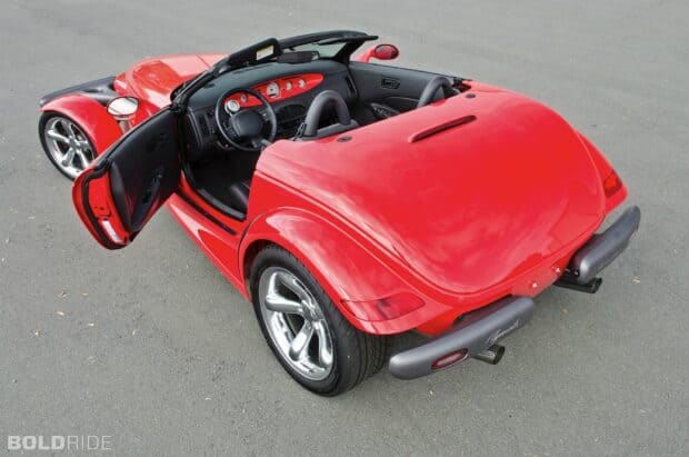 A red Plymouth Prowler with its driver side door open and a detailed interior, HD Desktop Wallpaper