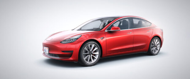 A red Tesla Model 3 is shown from the side with clear details and smooth lines, 2K Desktop Wallpaper
