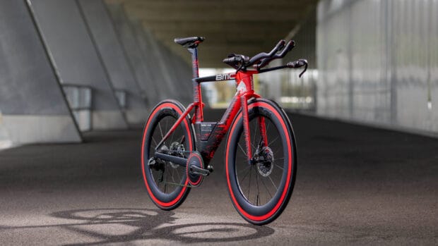 A red and black Bmc bike is displayed in a modern setting with clear details, HD Desktop Wallpaper