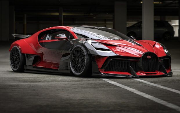 A sleek Bugatti Divo is parked indoors with detailed headlights and wheels, HD Desktop Wallpaper