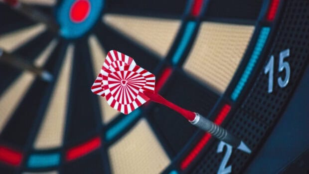 A close up view of a red dart hitting the number 2 section on the darts board, 4K Desktop Wallpaper