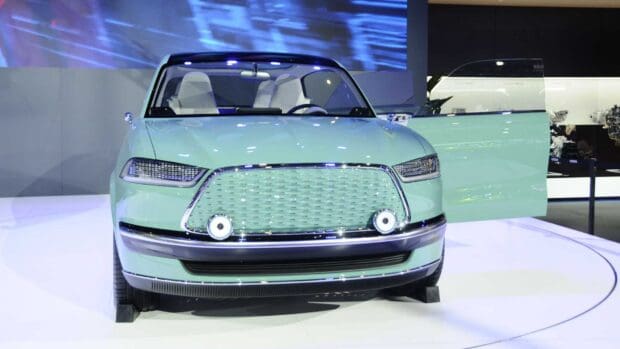 A retro style electric car in green color by Great Wall Motors with an open door, HD Desktop Wallpaper