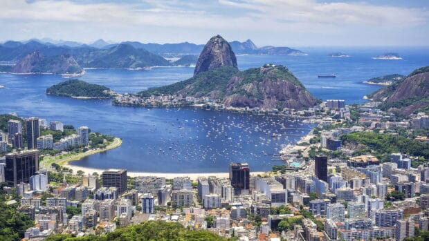 A panoramic view of Rio De Janeiro with mountains and water, HD Desktop Wallpaper