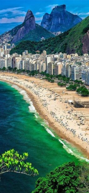 The image shows Rio De Janeiro city with the famous beaches and mountains, HD Mobile Wallpaper