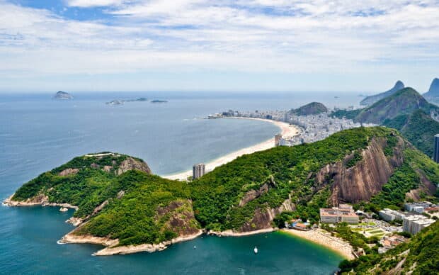 The Rio De Janeiro coast features lush hills and cityscapes by the ocean, HD Desktop Wallpaper