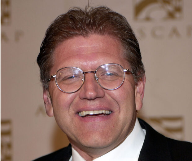 Robert Zemeckis is smiling warmly wearing round glasses at an event, HD Mobile Wallpaper