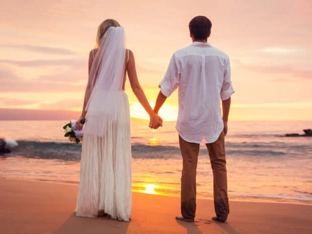A love couple holding hands on the beach during a beautiful sunset, HD Desktop Wallpaper