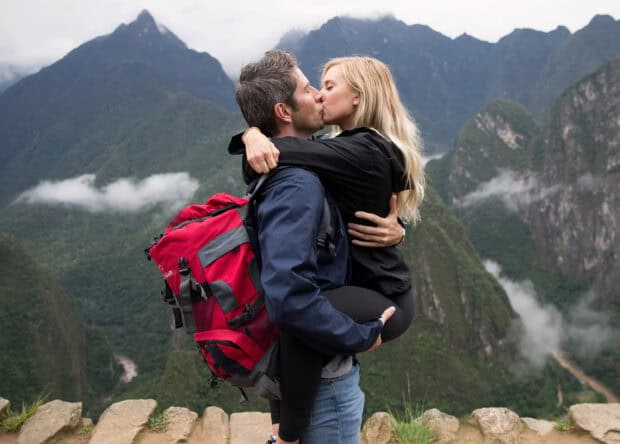 A loving couple kisses while hiking in the mountains in The Bachelor Tv Series Wallpapers, 2K Desktop Wallpaper