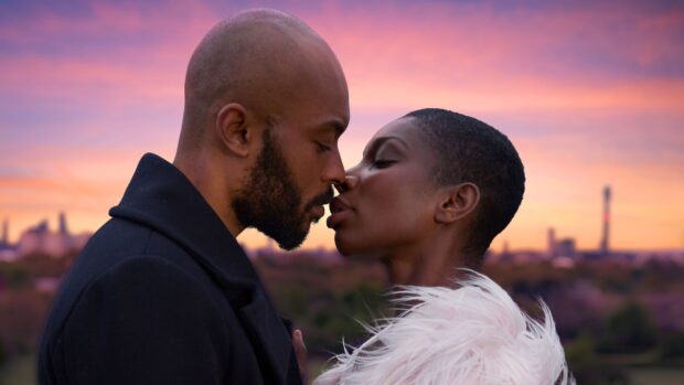 A tender moment shared by Michaela Coel with her partner at sunset, 4K Desktop Wallpaper