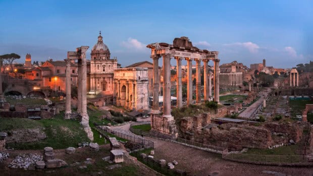 The Rome skyline reveals ancient ruins and historic buildings at sunset, HD Desktop Wallpaper