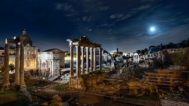 The Rome skyline features ancient ruins illuminated by moonlight and city lights, HD Desktop Wallpaper
