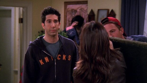 Ross looks concerned while talking to his friends in the apartment, HD Desktop Wallpaper