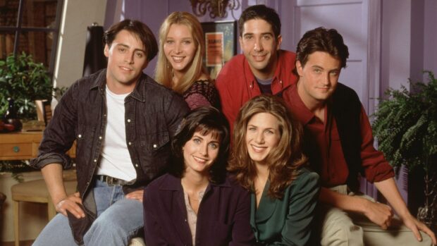 The Ross Friends group smiling together in a living room setting, HD Desktop Wallpaper