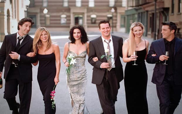 The Ross Friends group is walking arm in arm holding flowers and drinks, HD Desktop Wallpaper
