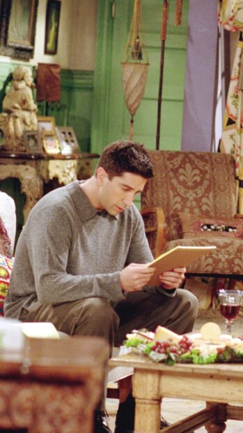 Ross Friends reading a letter in a cozy living room setting, HD Mobile Wallpaper