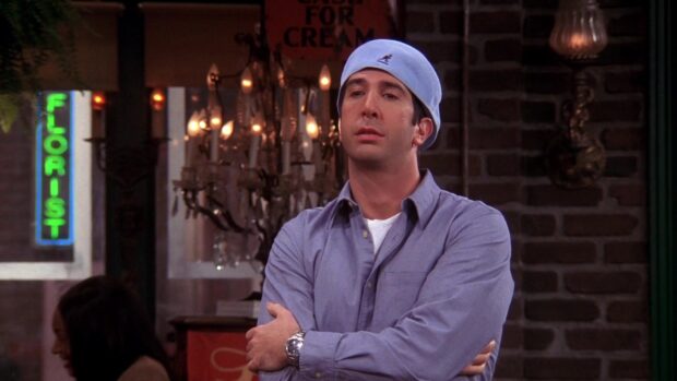 Ross is standing with arms crossed wearing a light blue shirt and cap, HD Desktop Wallpaper