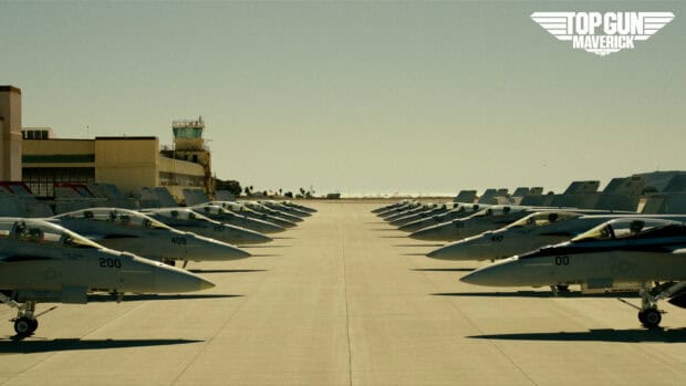 A row of fighter jets is parked on the runway in this Top Gun Maverick scene, HD Desktop Wallpaper