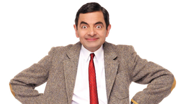Rowan Atkinson wallpapers shows a man in a brown tweed jacket and red tie smiling, HD Desktop Wallpaper