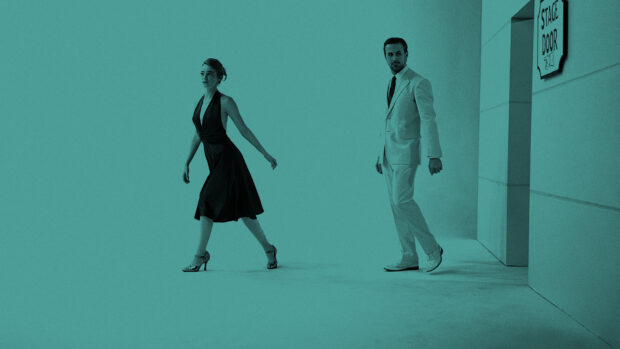 A man and woman walk near a stage door in the Ryan Gosling La La Land setting, HD Desktop Wallpaper
