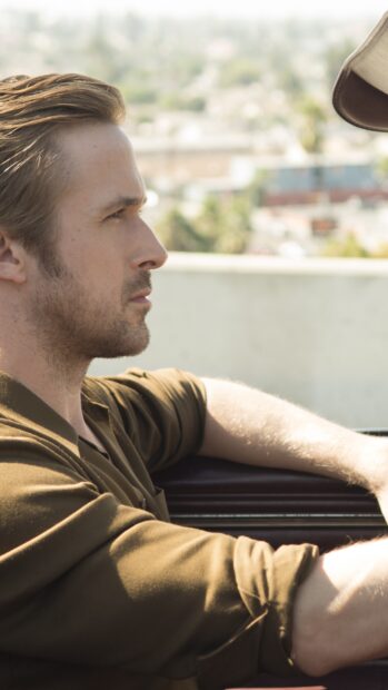 Ryan Gosling in a thoughtful moment from La La Land sitting in a car, 4K Phone Wallpaper