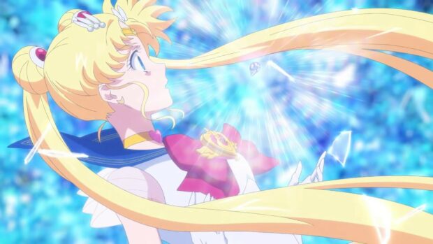 Sailor Moon Eternal wallpapers shows a bright magical energy surrounding the character as she gazes upward, HD Desktop Wallpaper