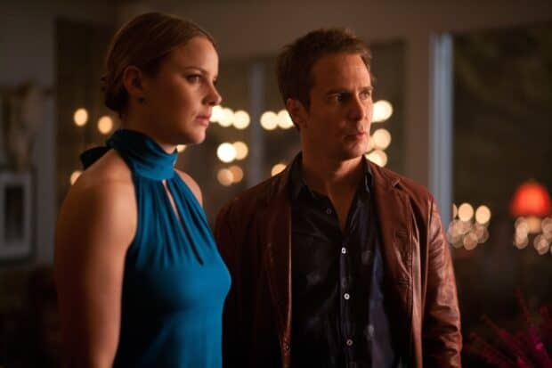 Sam Rockwell and a woman stand side by side in a softly lit room, HD Desktop Wallpaper