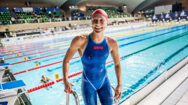 Sarah Sjostrom is smiling after finishing her race at the swimming pool, HD Desktop Wallpaper