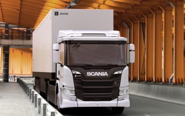 A Scania truck is parked inside a warehouse with orange structural beams, HD Desktop Wallpaper