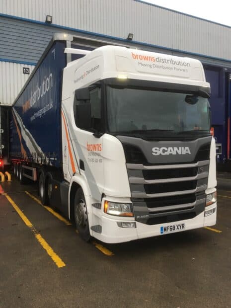 A white Scania truck with Browns Distribution logo parked near a warehouse, HD Desktop Wallpaper