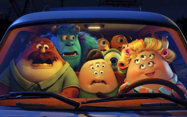 A frightened monster family is sitting together inside a car at night from Pixar Wallpapers, HD Desktop Wallpaper