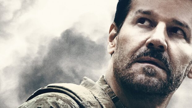A close up of a soldier from Seal Team tv series looking upwards with a cloudy background, HD Desktop Wallpaper
