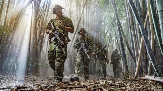 The Seal Team TV series shows soldiers moving through a dense bamboo forest on a mission, HD Desktop Wallpaper