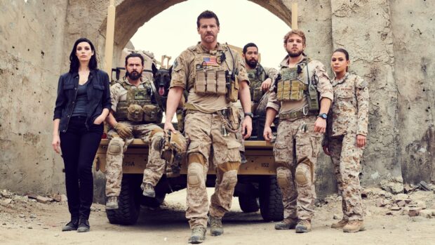 A Seal Team tv series wallpapers group stands armed in desert setting, 2K Desktop Wallpaper