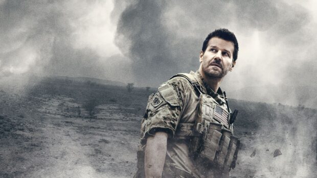 A Seal Team soldier looks concerned while standing in a smoky war zone, HD Desktop Wallpaper