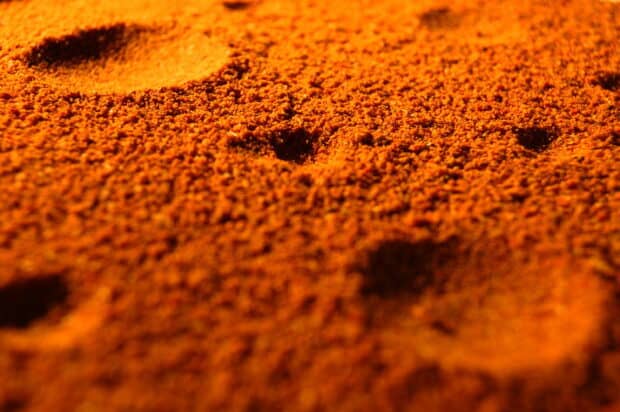 A close up view of seasoning powders showing detailed texture and color, 2K Desktop Wallpaper