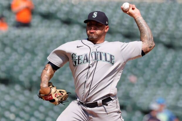 A Seattle Mariners player is pitching the baseball during a game, HD Desktop Wallpaper