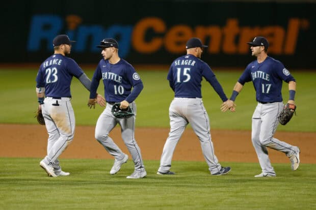 Seattle Mariners players celebrate on field after the game, 2K Desktop Wallpaper