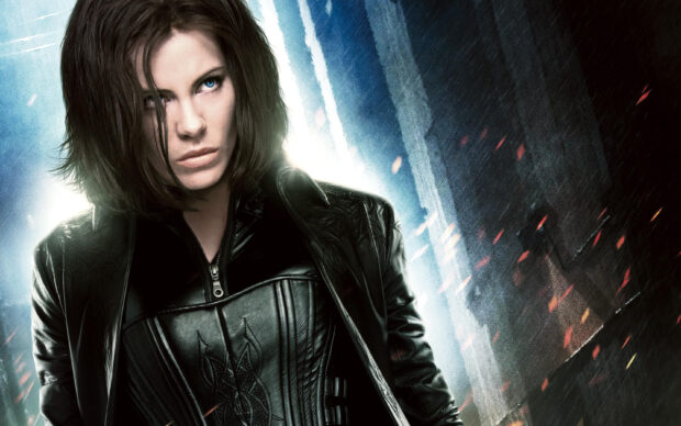 Selene is shown wearing black leather with a determined look in this Selene Underworld wallpaper, 2K Desktop Wallpaper