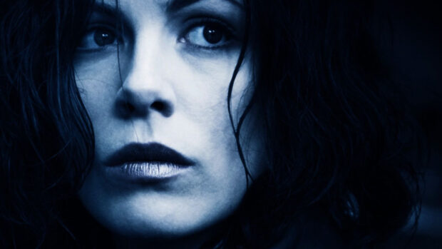 The image shows Selene with a serious expression and dark hair, Selene Underworld Wallpapers, HD Desktop Wallpaper