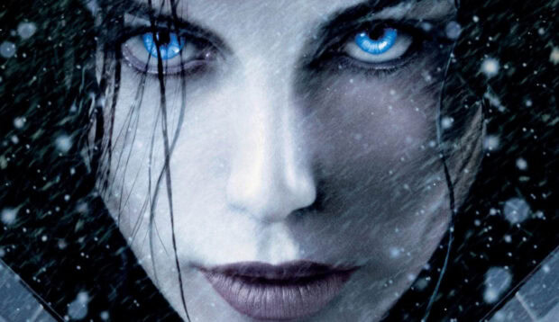 A close up of Selene focusing on her piercing blue eyes and intense expression, HD Desktop Wallpaper