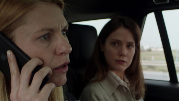 A woman is making a phone call while another listens closely in a car, Homeland Wallpapers, HD Desktop Wallpaper