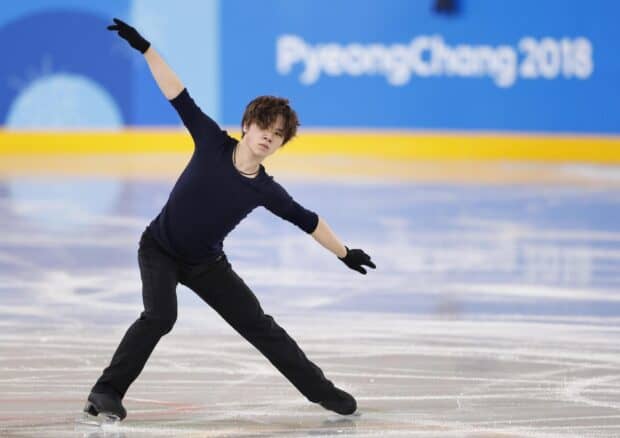 Shoma Uno performs an elegant figure skating routine on ice, HD Desktop Wallpaper