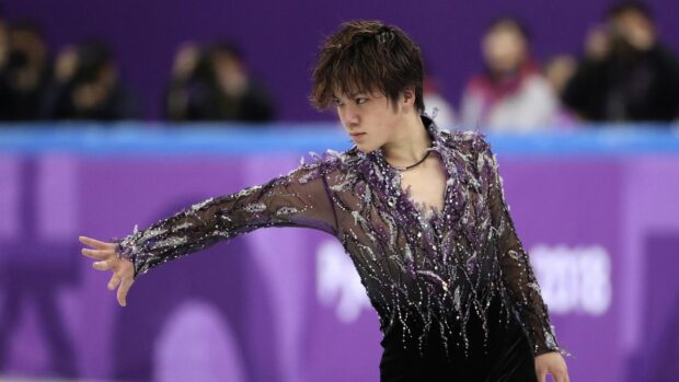 Shoma Uno performs a focused and elegant figure skating routine on ice, 2K Desktop Wallpaper