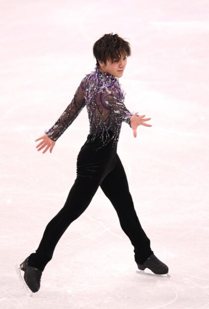 Shoma Uno performs a graceful figure skating routine in a sparkling outfit, HD Desktop Wallpaper