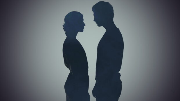 A romantic silhouette of a love couple standing close and looking at each other, 4K Desktop Wallpaper